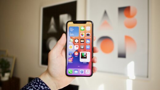 person holding black iphone iOS
